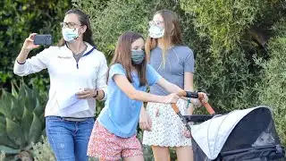 Jennifer Garner Snaps Selfies During Her Evening Stroll With The Kiddies