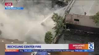 Junk yard burns in Panorama City
