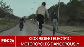 Kids riding electric motorcycles dangerously