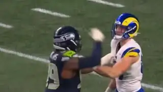 Leonard Williams swipes at Davis Allen during Rams-Seahawks game
