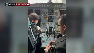 Liam Conejo Ramos, 5, visits the flight deck before returning home to Minneapolis