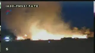 Live now: Large fire burning off I-30 in Rockwall County