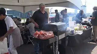 Local consulting firm hosts BBQ for Dew Drop Inn