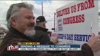 Local postal workers rally to keep sixt-day delivery