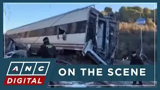 LOOK: Eyewitness video shows derailed Spanish train carriages, passengers inside | ANC