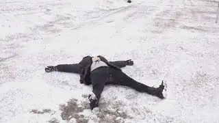 Making a snow angel in Sumter, South Carolina