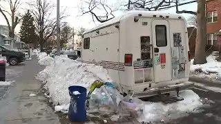 Man and dog found dead in mobile vet van in Queens