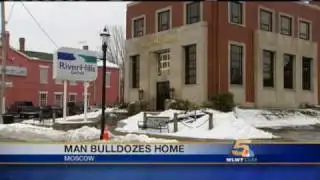 Man Bulldozes His Own Home