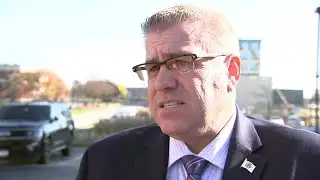 Man charged with threatening to 