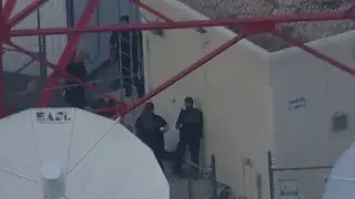 Man climbs down from News 6 tower