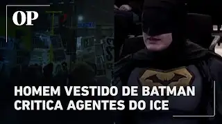 Man dressed as Batman criticizes ICE agents.