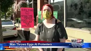 Man throws eggs at protestors