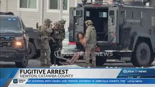 Man wanted after being shot by Newton officer in custody