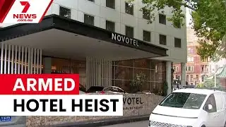 Manhunt underway after Darling Square hotel robbery | 7NEWS