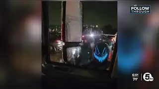 Masked mob confronts party bus on freeway