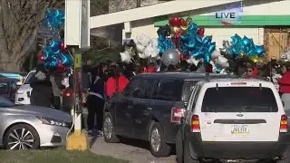 Memorial grows outside of Chicken Shack