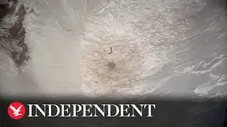 Moment missing hiker buried under avalanche waves down rescue helicopter