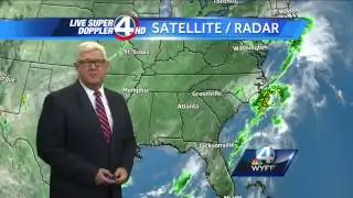 Mostly cloudy, breezy.