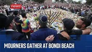 Mourners gather at Bondi Beach after terror attack