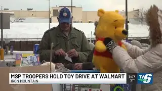 MSP troopers hold toy drive at Iron Mountain Walmart