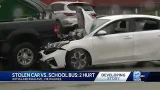 Multi-vehicle crash including Kia, school bus, leaves 2 injured