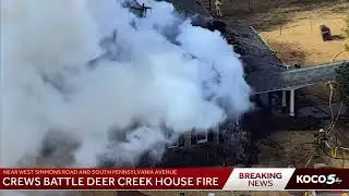 Multiple agencies battle house fire in Deer Creek