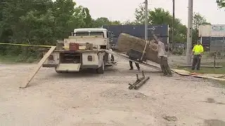 Multiple bodies found in exhumed Salem, Ill., grave 