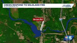 Multiple departments fighting wild land fire in Plattsburgh