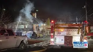 Multiple fire departments battle house fire