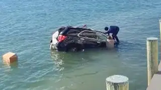 Navy Rescue Swimmer Saves Woman In Sinking SUV