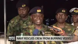 Navy Rescues Crew From Burning Vessel 