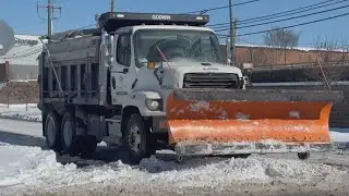 NCDOT crews working to clear icy, snowy roads