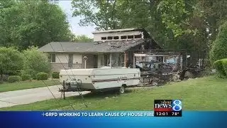 Neighbors hear explosion, home severely damaged by fire