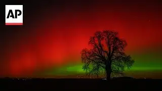 Northern lights shine in the night sky over Germany