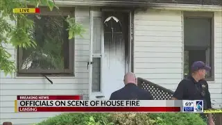 Officials on scene of house fire