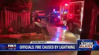 Officials say fire was caused by lightning strike