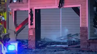 Omaha fire crews battle fire as flames engulf an Elkhorn home