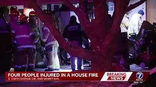 Omaha firefighters rescue multiple people from house fire