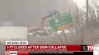 Overhead sign falls across I-77 after semi crash