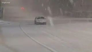 Overnight snowfall blankets Western Washington