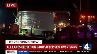 Overturned semi shuts down interstate ramp
