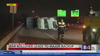 Overturned semi snarls downtown traffic