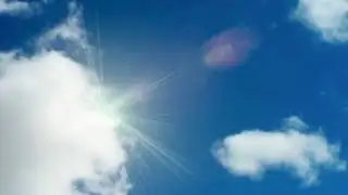 Partly cloudy and breezy