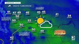 Partly to mostly cloudy, breezy/gusty, and warmer this weekend