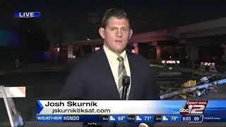 Passenger hospitalized after truck crashes into traffic light