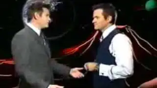 Paul McDermott Singing  "Opps I Did It Again"