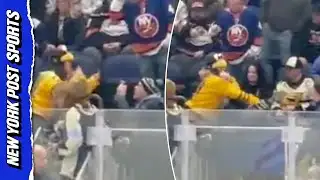 Penguins fan ATTACKS Islanders supporter!