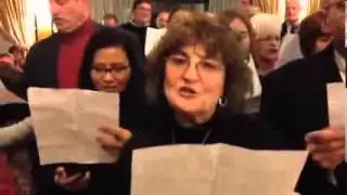 Pilgrims serenade Cardinal Dolan as he prepares to return