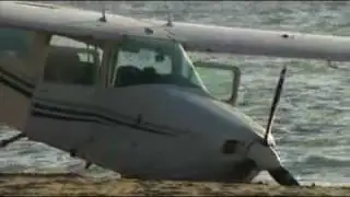 Plane makes safe beach landing