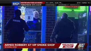 Police searching for suspect after armed robbery at Reading smoke shop